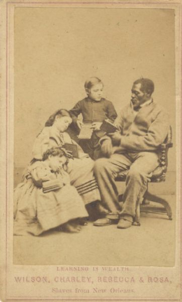 Wilson Chinn - of the Branded Slave Fame - is Photographed with the ‘White’ Slave Children of New Orleans